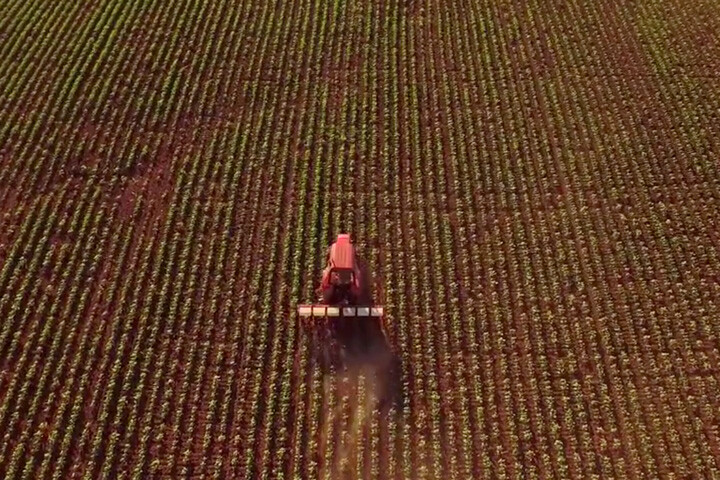 Overhead photo of tractor on a farm
